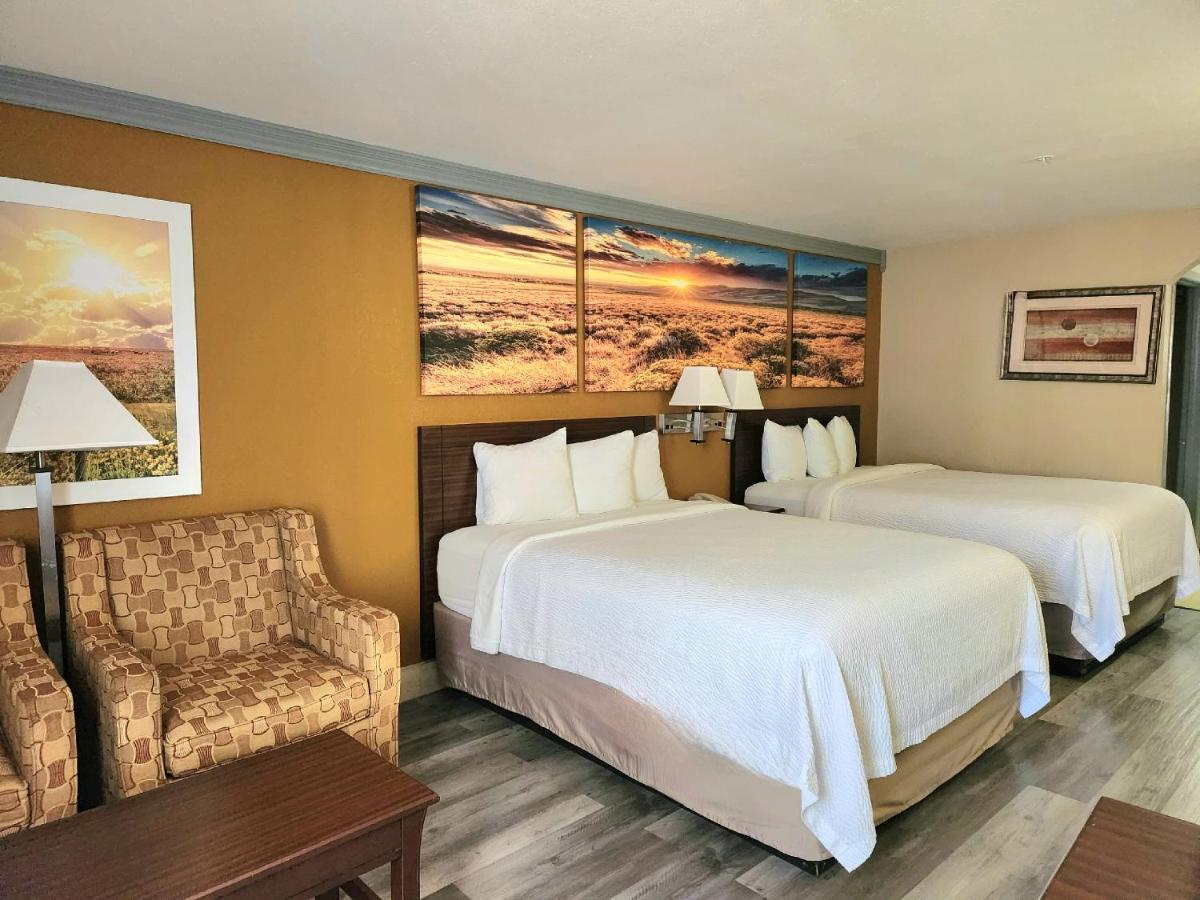 Queen Room with Two Queen Beds and Roll-In Shower - Mobility/Hearing Accessible - Non-Smoking at Days Inn by Wyndham Rosenberg
