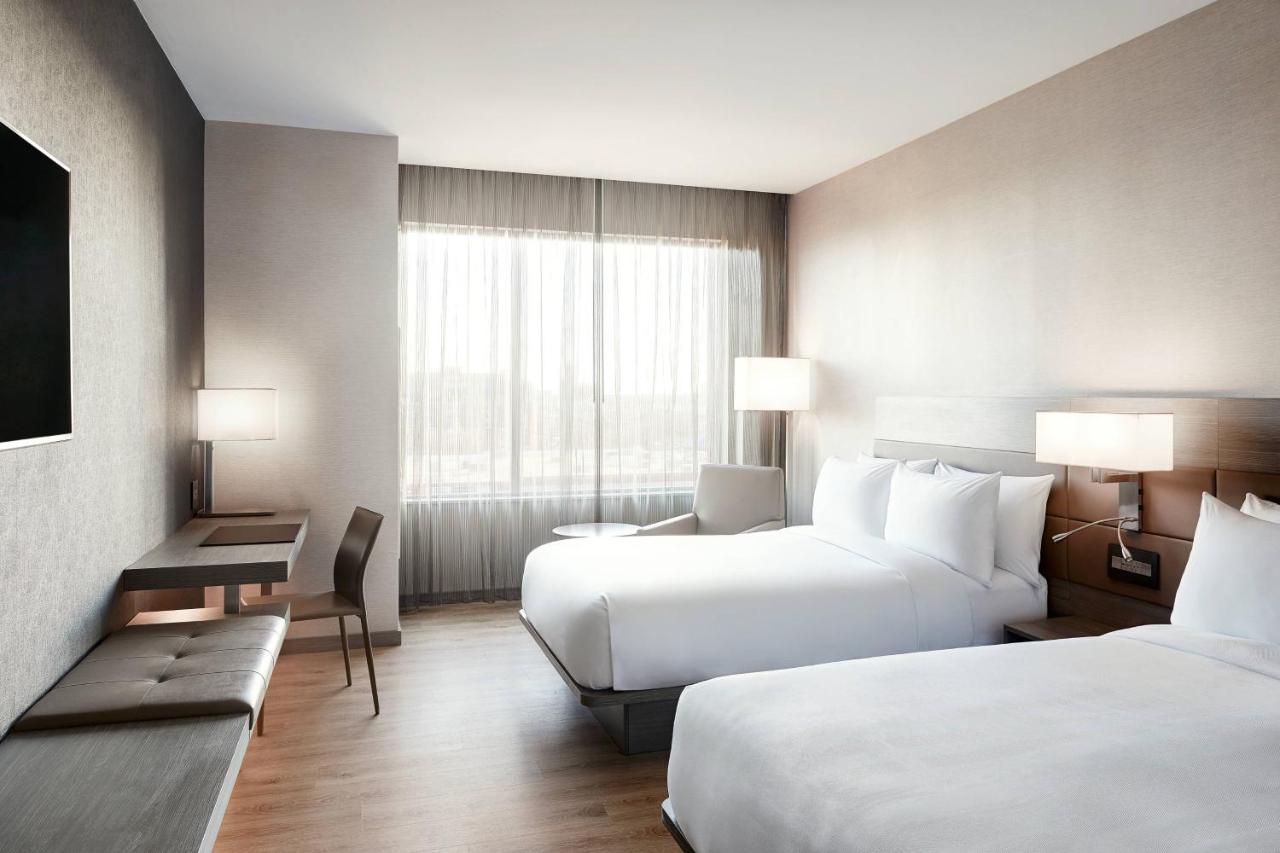 Double Room with Two Double Beds and Adapted Tub - Mobility Accessible at AC Hotel by Marriott Oklahoma City Bricktown