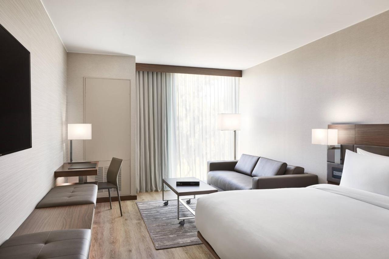 King Guest Room with Sofa Bed at AC Hotel by Marriott Phoenix Biltmore