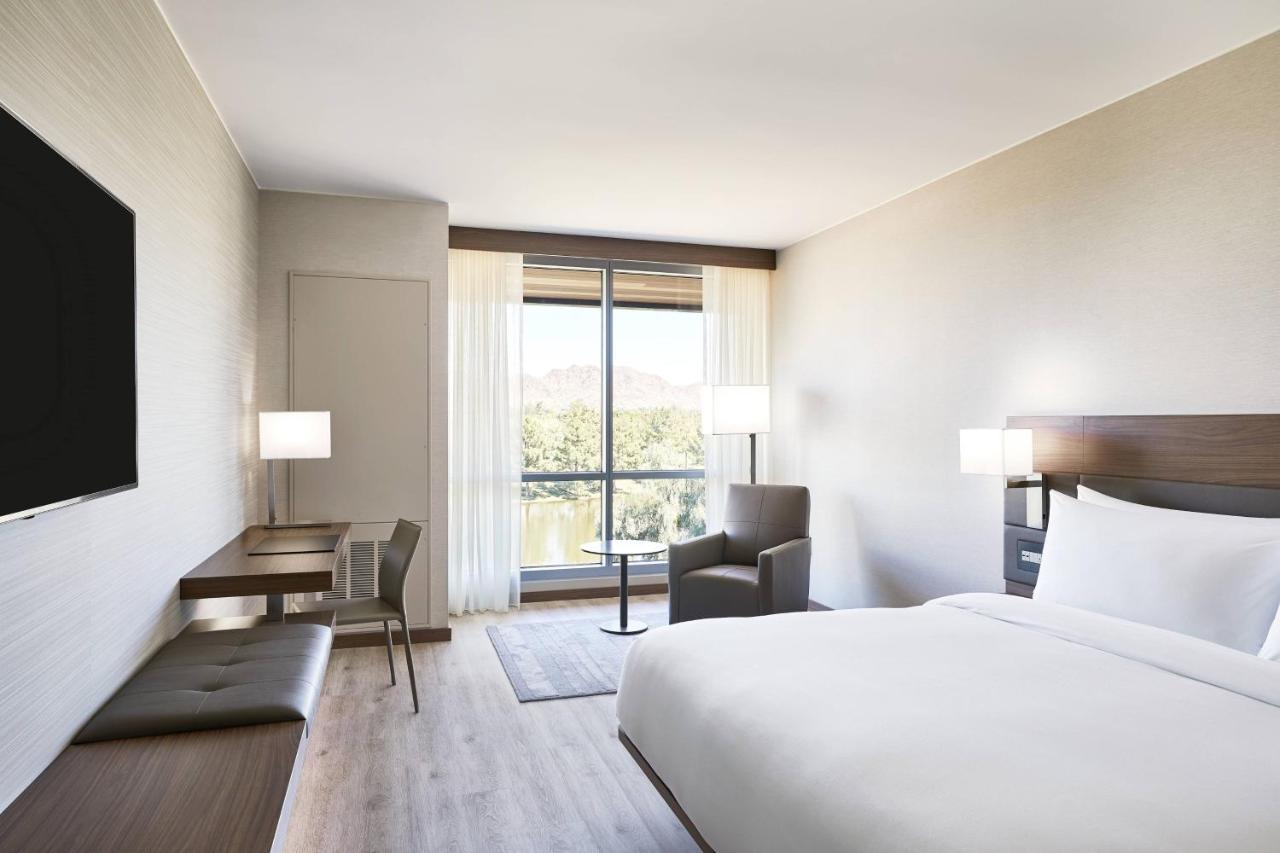 Guest room with king bed and mountain view at AC Hotel by Marriott Phoenix Biltmore