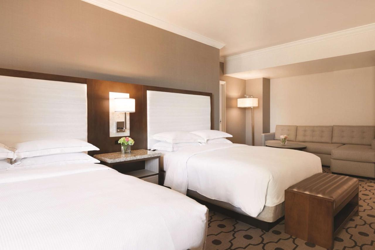 Superior Queen Room with Two Queen Beds with Roll in Shower at Hilton Los Angeles/San Gabriel