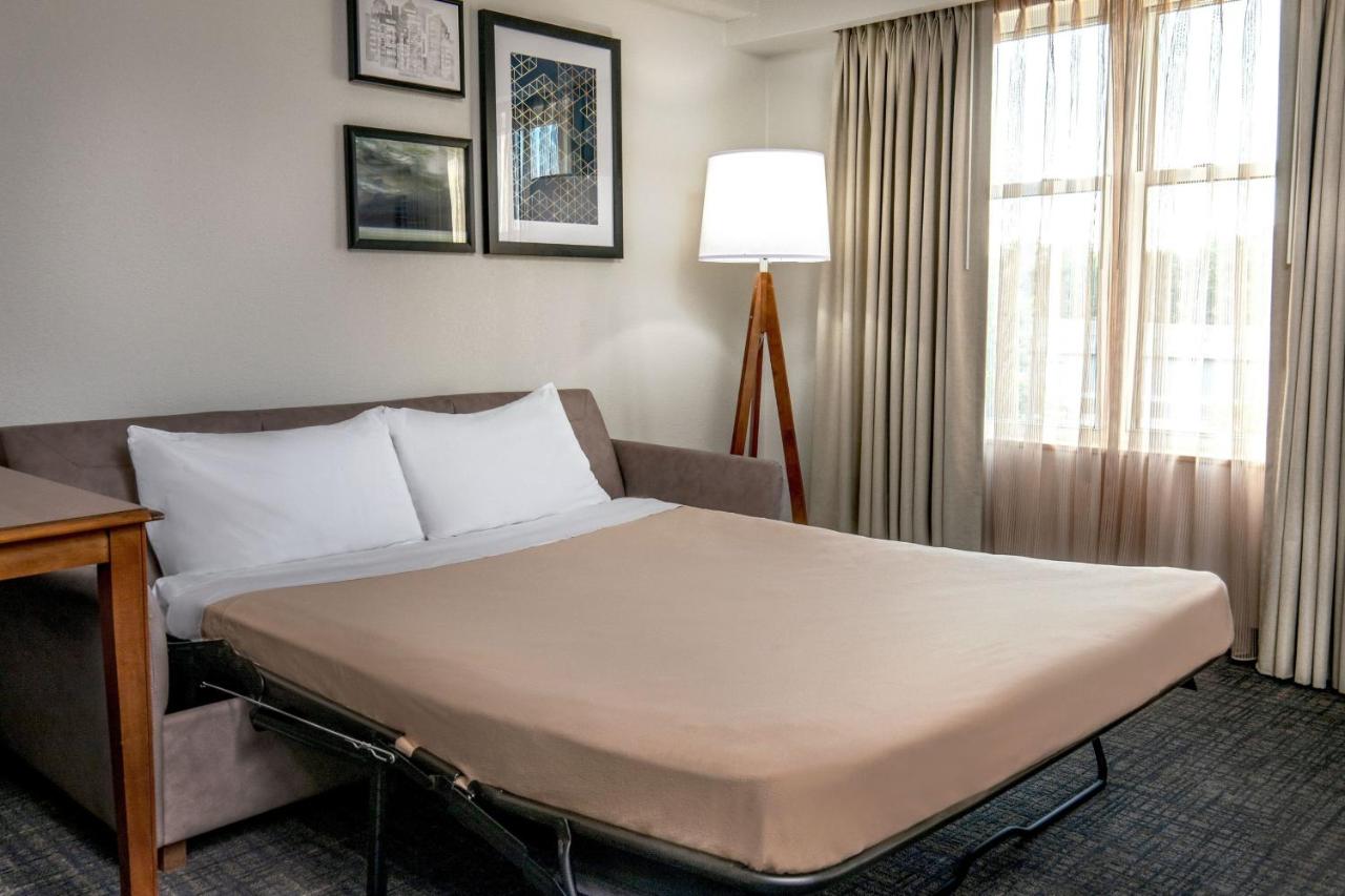 Two-Bedroom Suite with 2 Queen Beds, Sofa Bed, Full Kitchen, Living Space at Residence Inn by Marriott Chesapeake Greenbrier