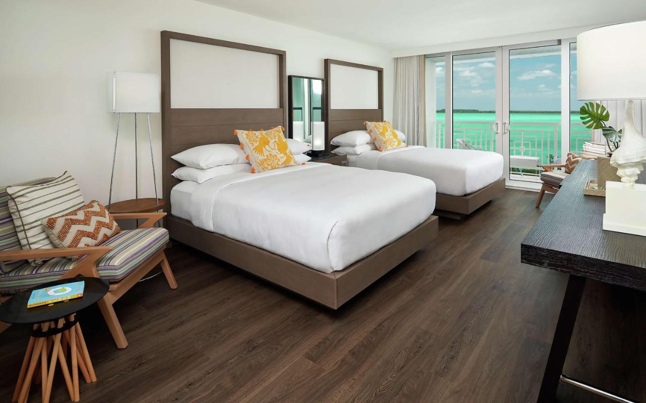 Waterfront Queen Room with Two Queen Beds and Terrace at Baker's Cay Resort Key Largo, Curio Collection by Hilton