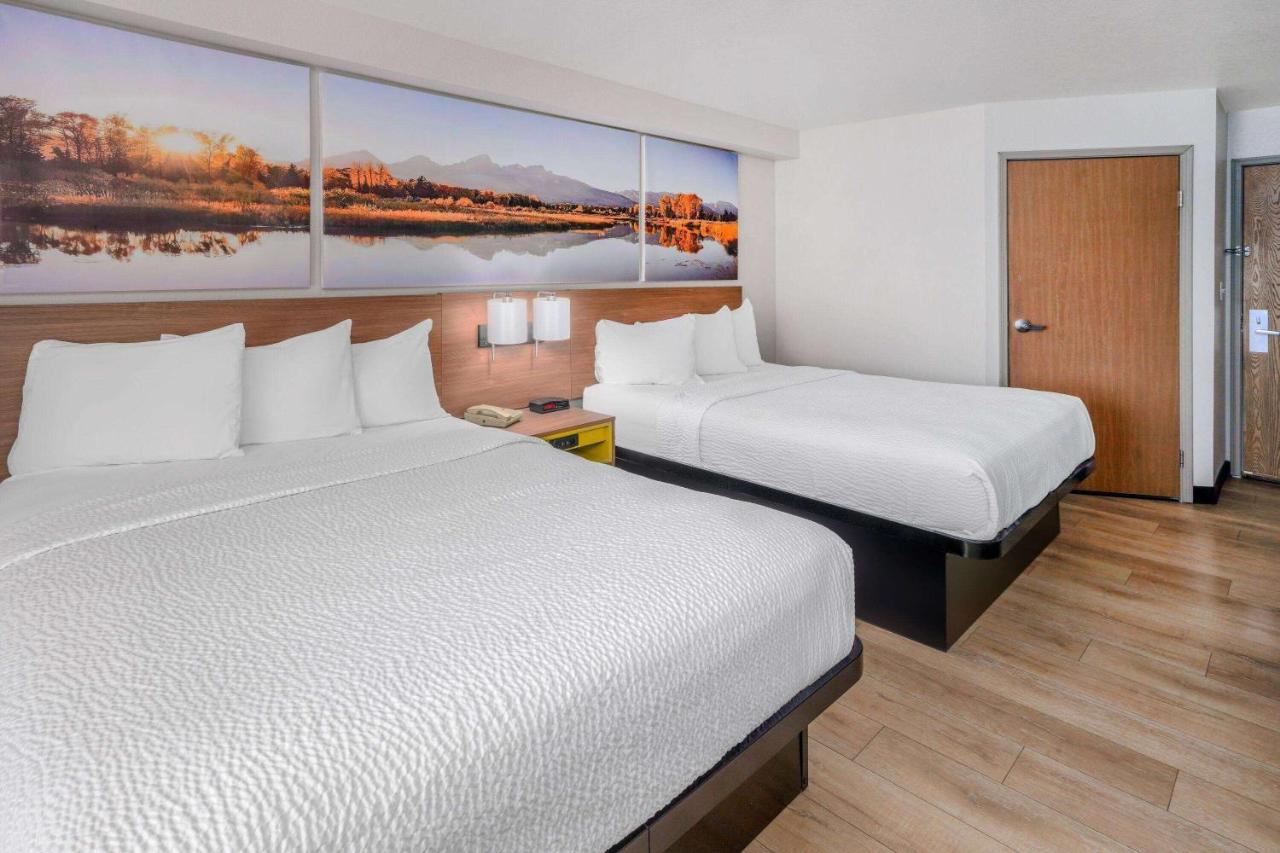 Queen Room with Two Queen Beds - Non-Smoking at Days Inn & Suites by Wyndham Greeley
