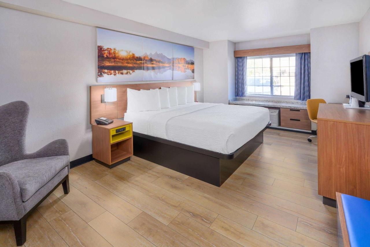 King Room - Mobility Access/Non-Smoking at Days Inn & Suites by Wyndham Greeley