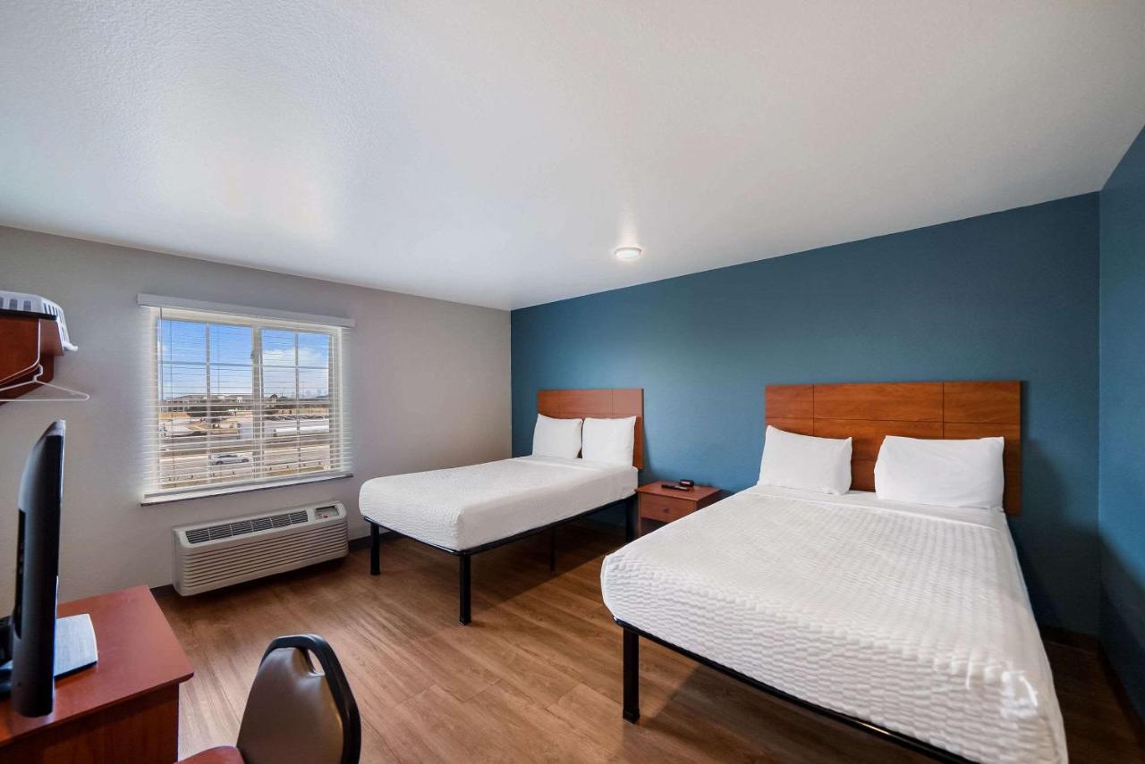 Standard Double Room with Two Double Beds and Sofa Bed - Non-Smoking at WoodSpring Suites Fort Worth Fossil Creek