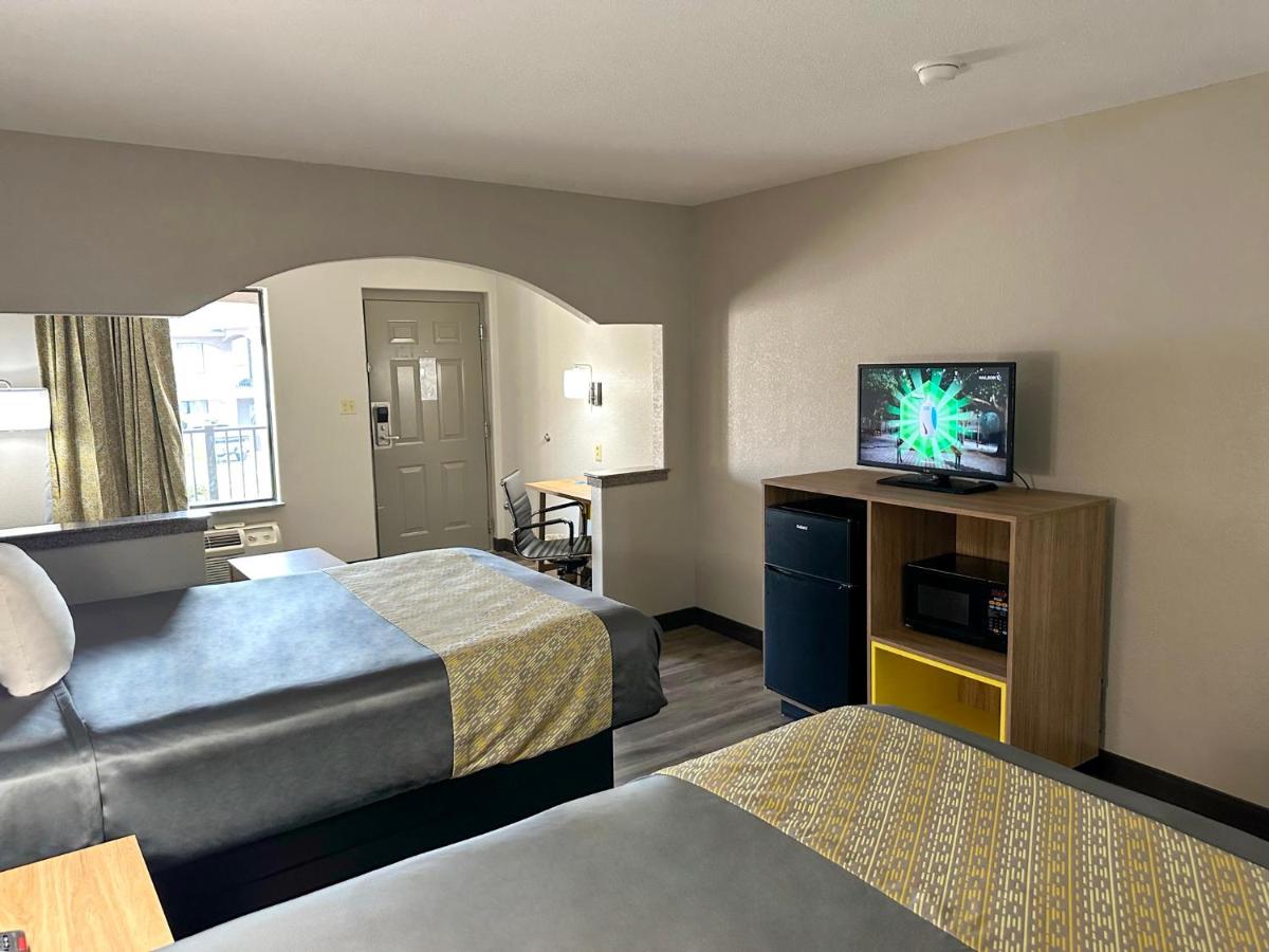 Queen Suite with Two Queen Beds - Smoking at Days Inn & Suites by Wyndham Opelousas