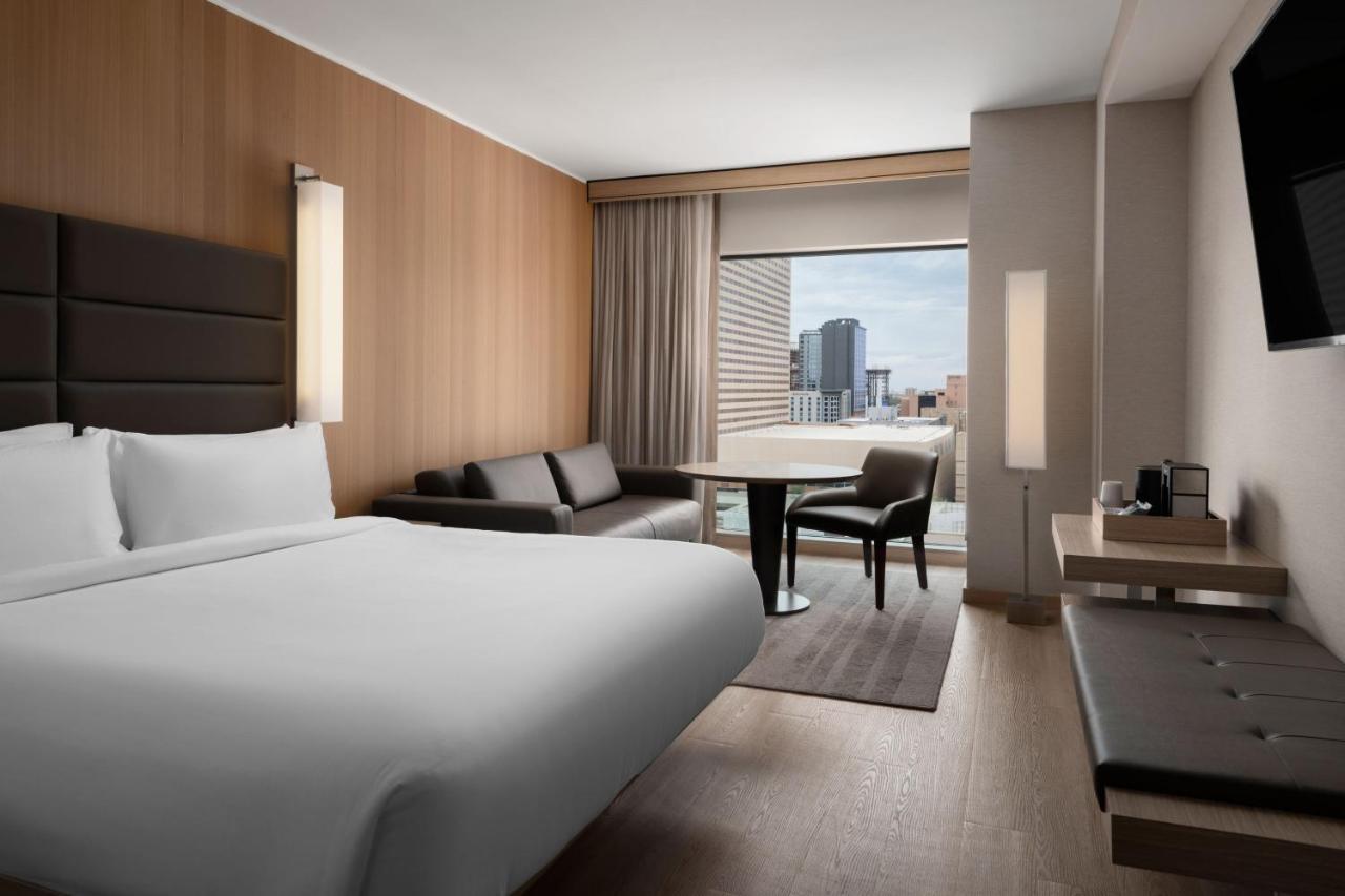 King Guest Room with Sofa Bed and City View at AC Hotel by Marriott Phoenix Downtown