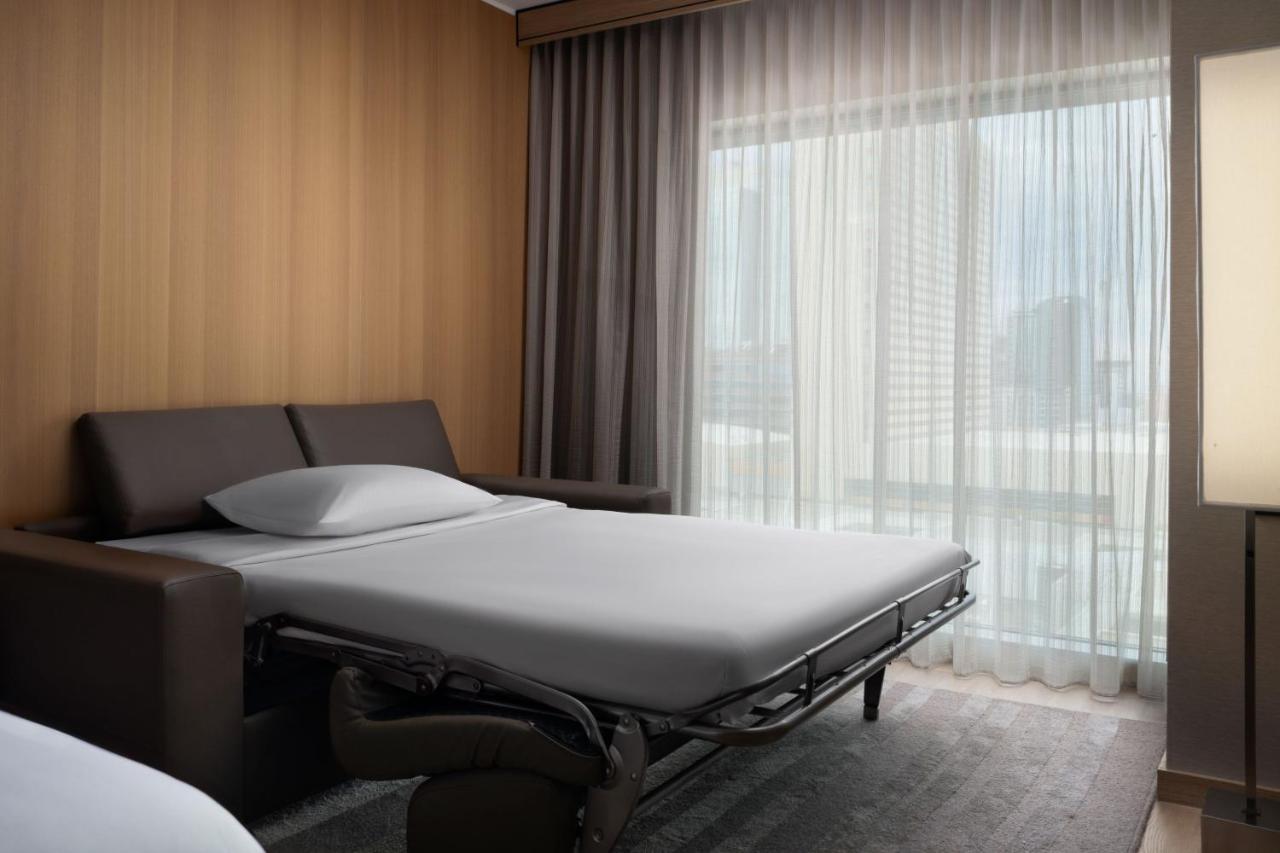 King Guest Room with Sofa Bed and City View at AC Hotel by Marriott Phoenix Downtown