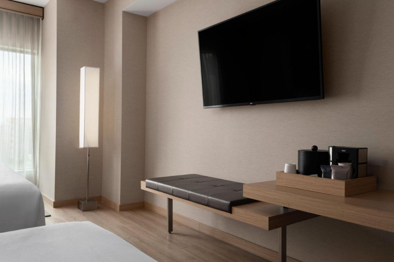 King Guest Room with Sofa Bed and City View at AC Hotel by Marriott Phoenix Downtown