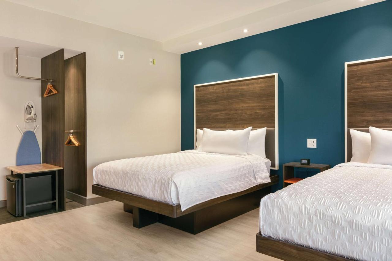 Queen Room with Two Queen Beds - Hearing Accessible at Tru by Hilton Charlotte Ayrsley