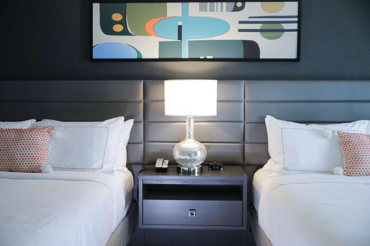 Queen Room with Two Queen Beds at The Rewind West Des Moines, Tapestry Collection by Hilton