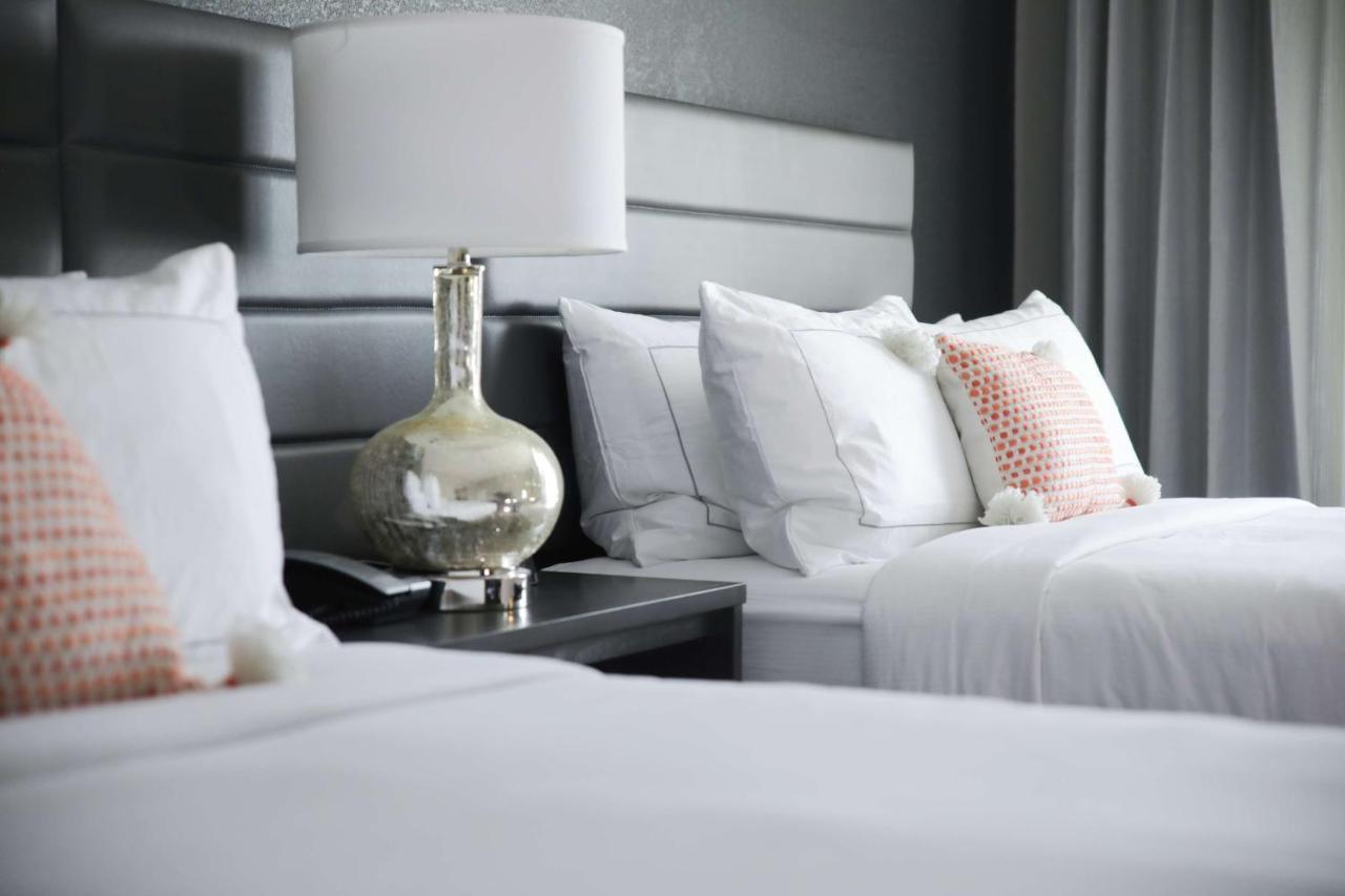 Queen Room with Two Queen Beds at The Rewind West Des Moines, Tapestry Collection by Hilton