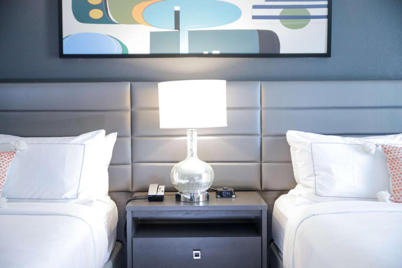 Queen Room with Two Queen Beds at The Rewind West Des Moines, Tapestry Collection by Hilton
