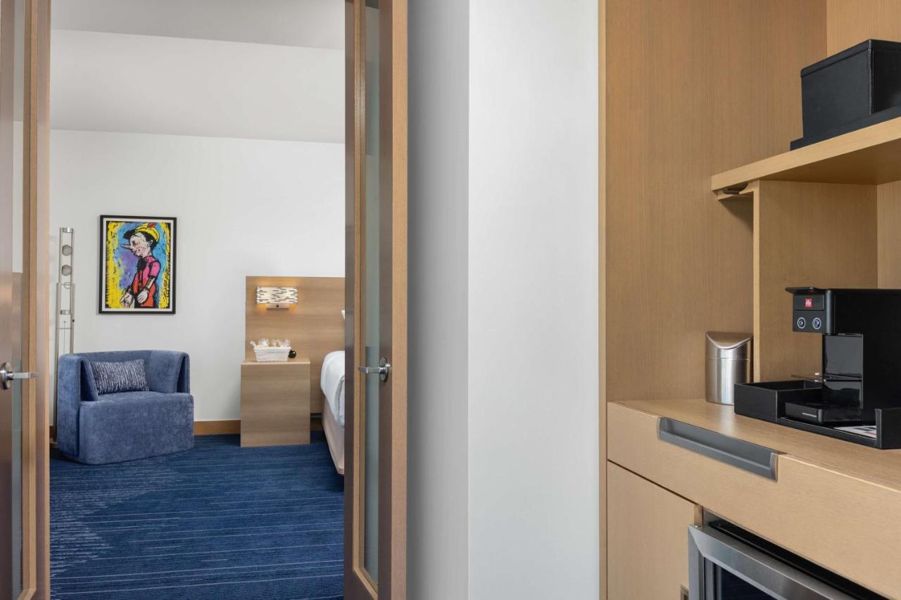 One Bedroom King Suite with Balcony at The Art Hotel Denver, Curio Collection by Hilton