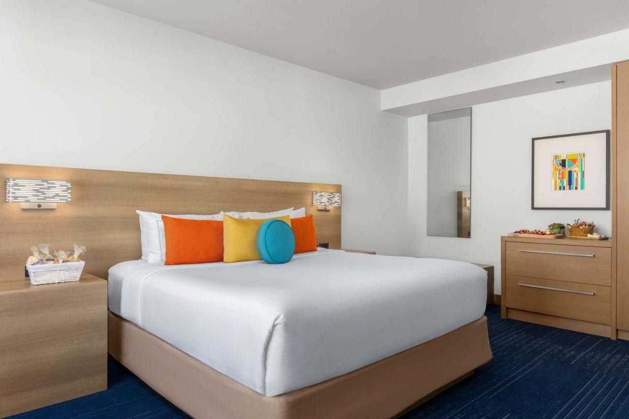 One Bedroom King Suite with Balcony at The Art Hotel Denver, Curio Collection by Hilton