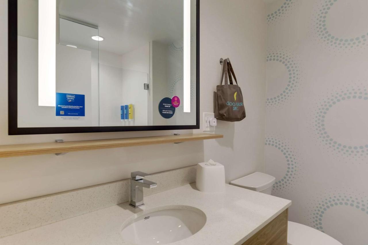 Queen Room with Two Queen Beds and Walk In Shower at Tru By Hilton Raleigh Garner