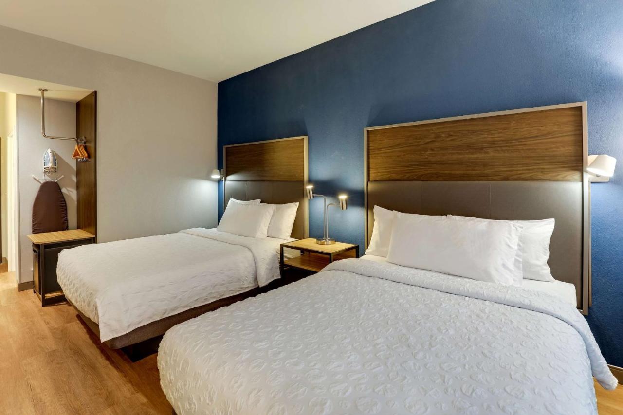 Queen Room with Two Queen Beds and Walk In Shower at Tru By Hilton Raleigh Garner