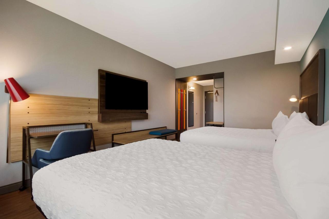Queen Room with Two Queen Beds and Walk-In Shower at Tru By Hilton Destin