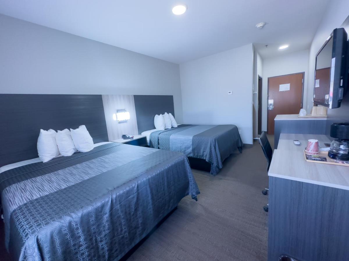 Queen Room with Two Queen Beds at American Inn Madill