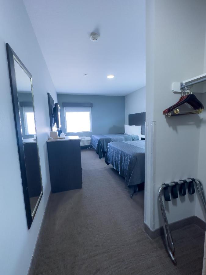 Queen Room with Two Queen Beds at American Inn Madill