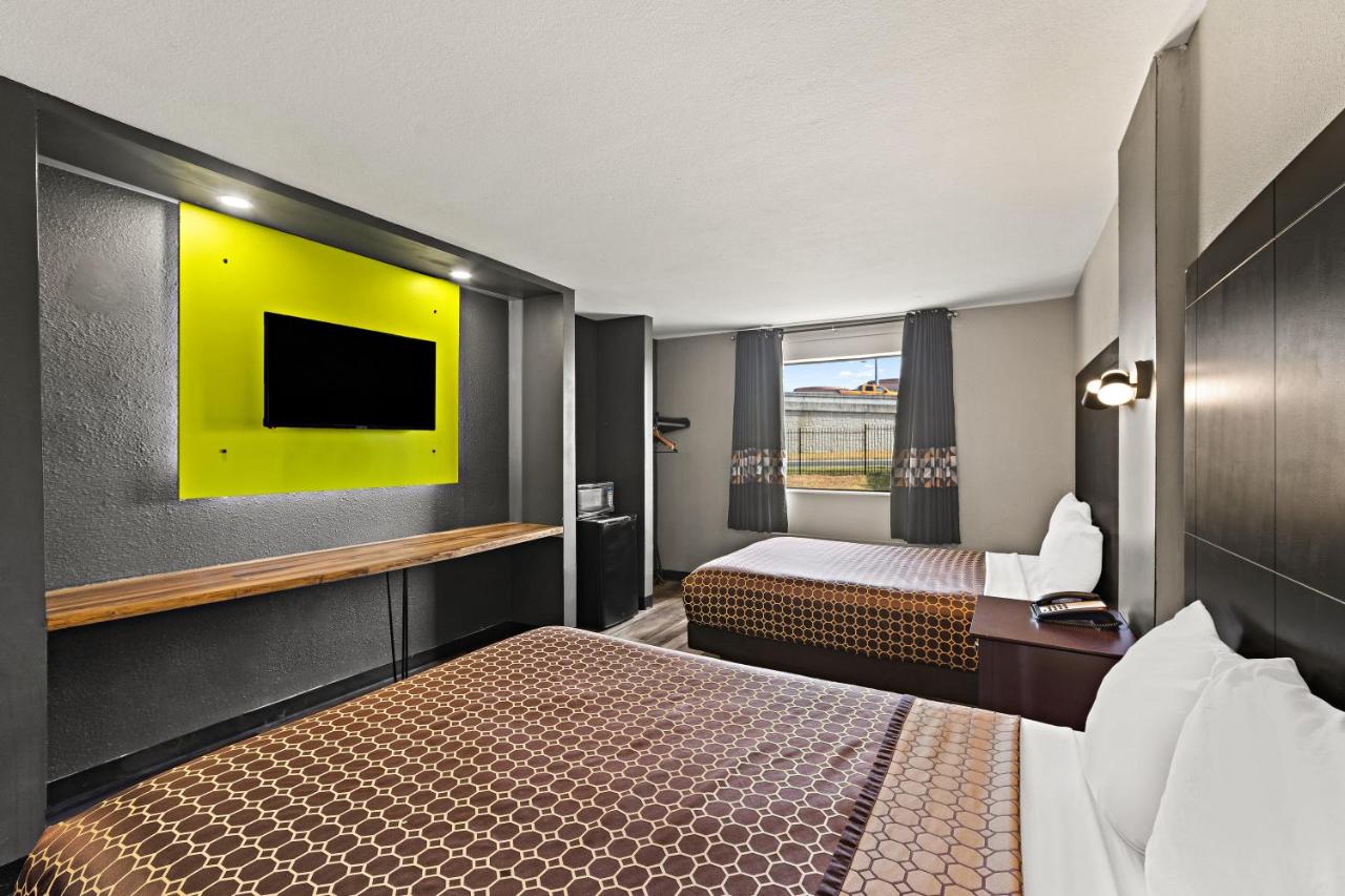Queen Room with Two Queen Beds - Non-Smoking at Rodeway Inn & Suites Downtown North