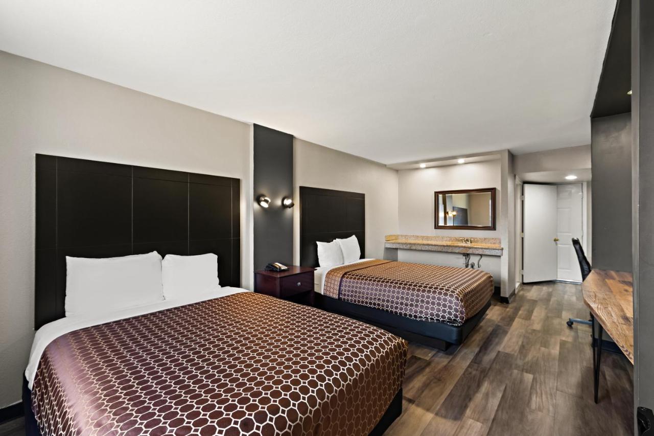 Queen Room with Two Queen Beds - Non-Smoking at Rodeway Inn & Suites Downtown North