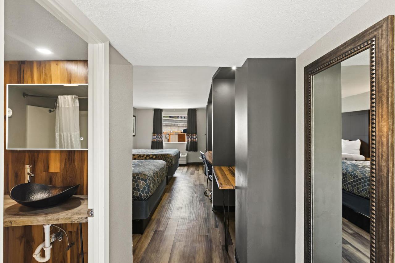 Queen Room with Two Queen Beds - Non-Smoking at Rodeway Inn & Suites Downtown North