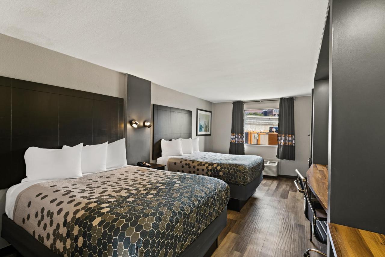 Queen Room with Two Queen Beds - Non-Smoking at Rodeway Inn & Suites Downtown North
