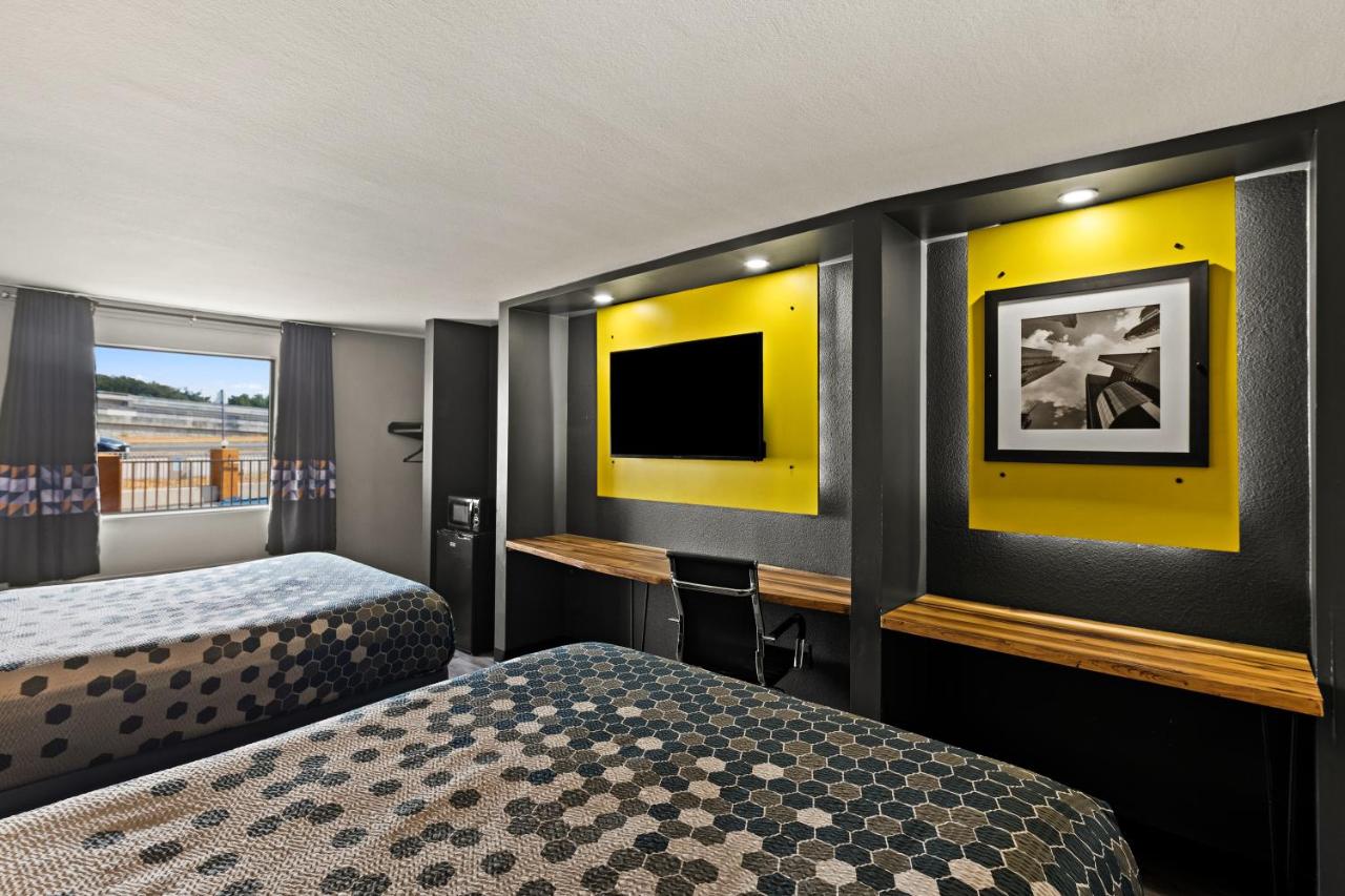 Queen Room with Two Queen Beds - Non-Smoking at Rodeway Inn & Suites Downtown North