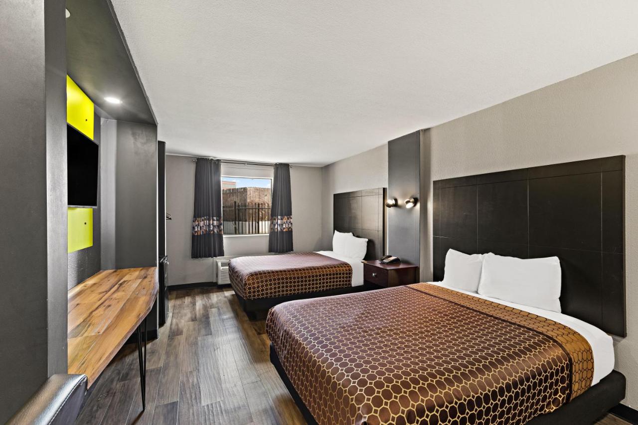 Queen Room with Two Queen Beds - Non-Smoking at Rodeway Inn & Suites Downtown North