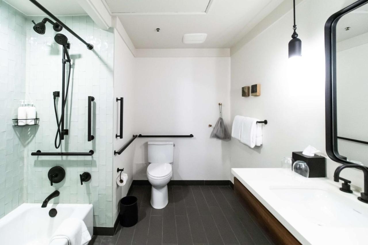 Deluxe King Room with Bathtub - Mobility Accessible at The Alexis Royal Sonesta Hotel Seattle