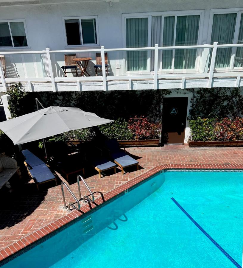 Standard Room with Two Queen Beds with Pool View at Capri Laguna on the Beach