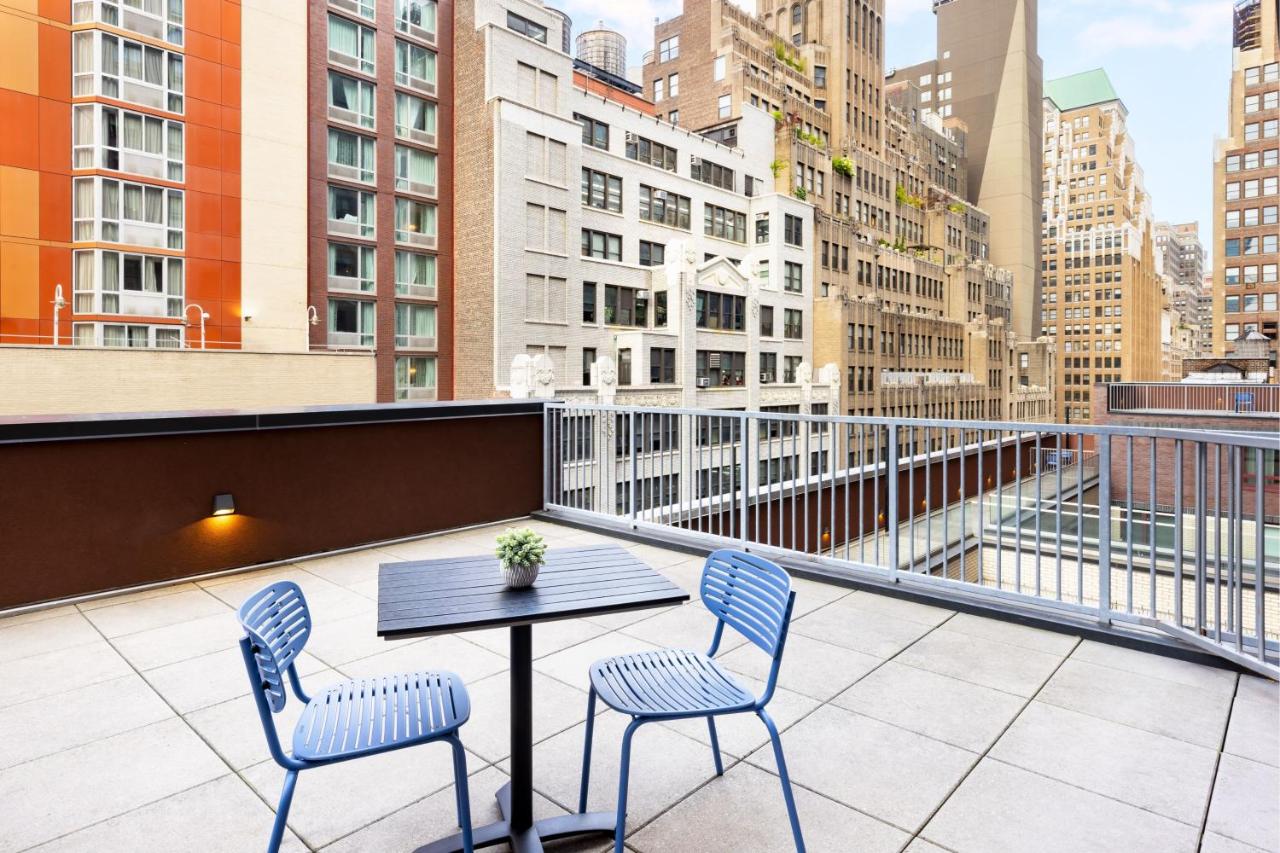 Queen Room with Two Queen Beds and Terrace at SpringHill Suites by Marriott New York Manhattan/Times Square South