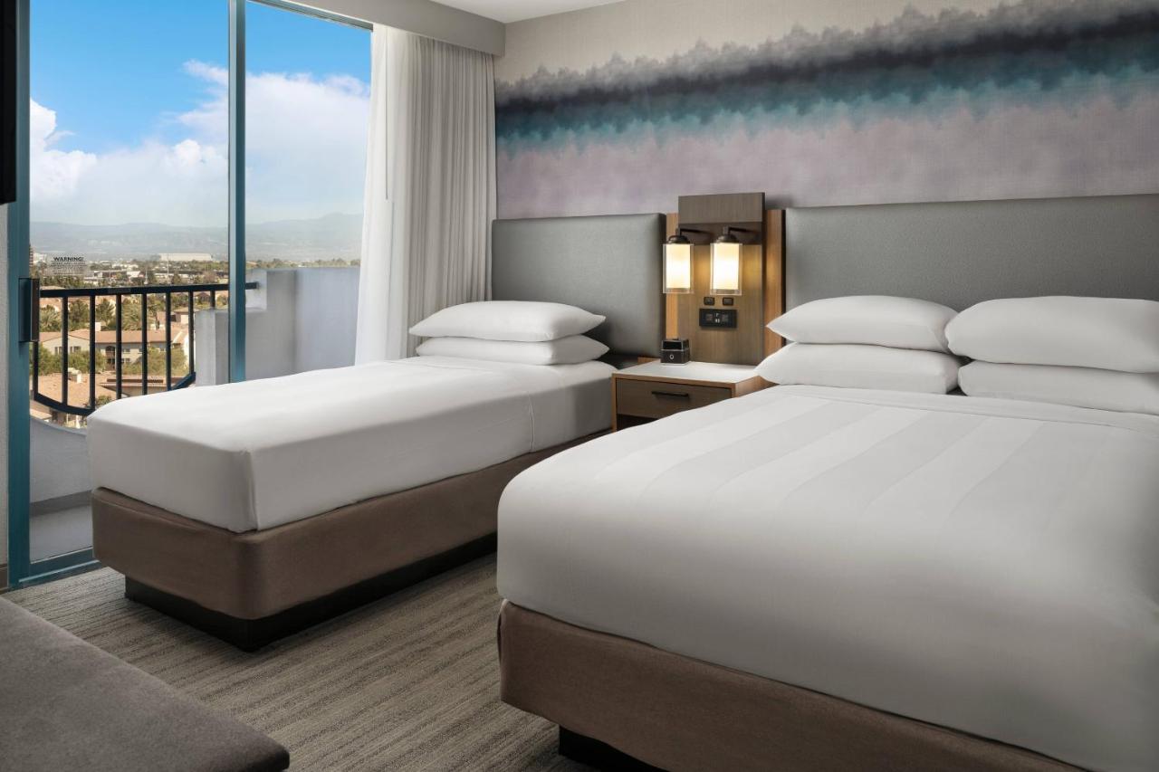 One Bedroom Suite with Two Double Beds or Twin Beds and a Sofa at Costa Mesa Marriott