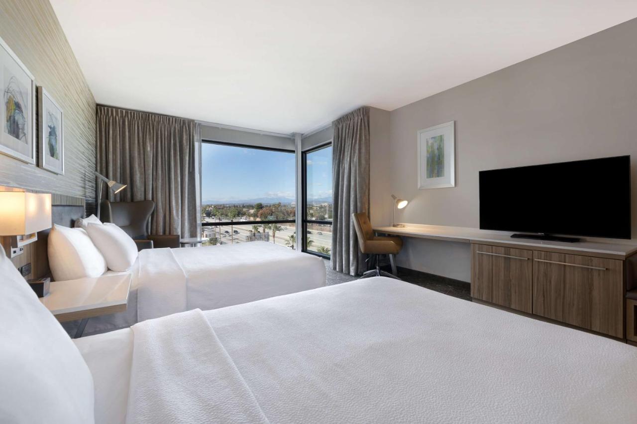Queen Corner Room with Two Queen Beds and View at Hilton Garden Inn Anaheim Resort