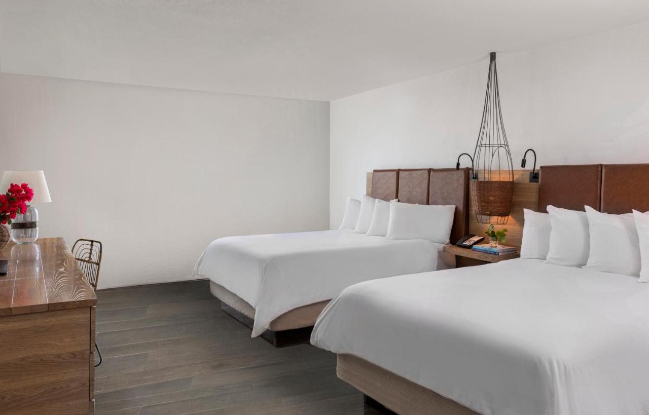 Oceanfront Suite with Two Queen Beds at Amara Cay Resort