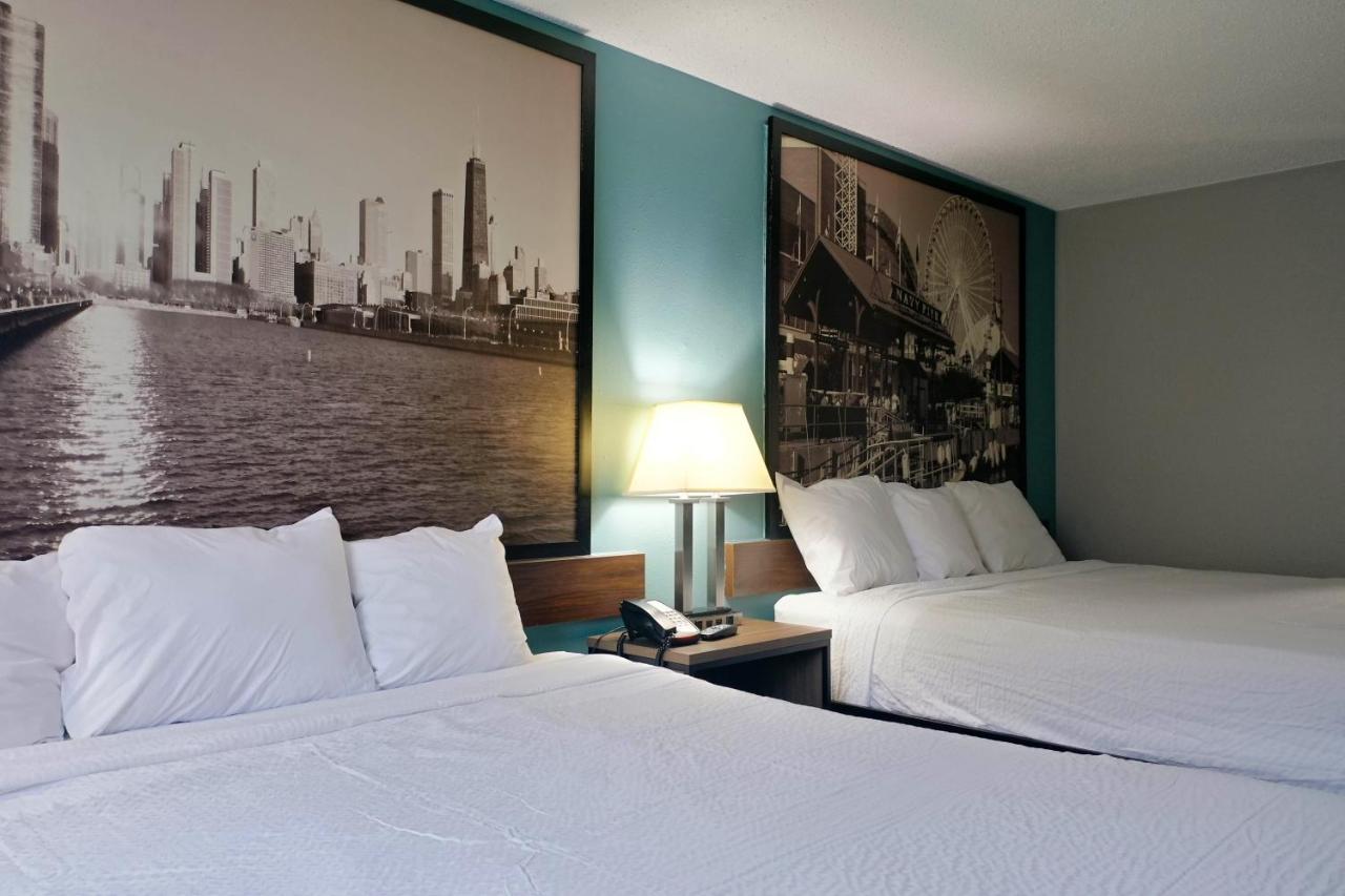 King Room with Two King Beds - Non-Smoking at Super 8 by Wyndham Rockford I-90/Casino District