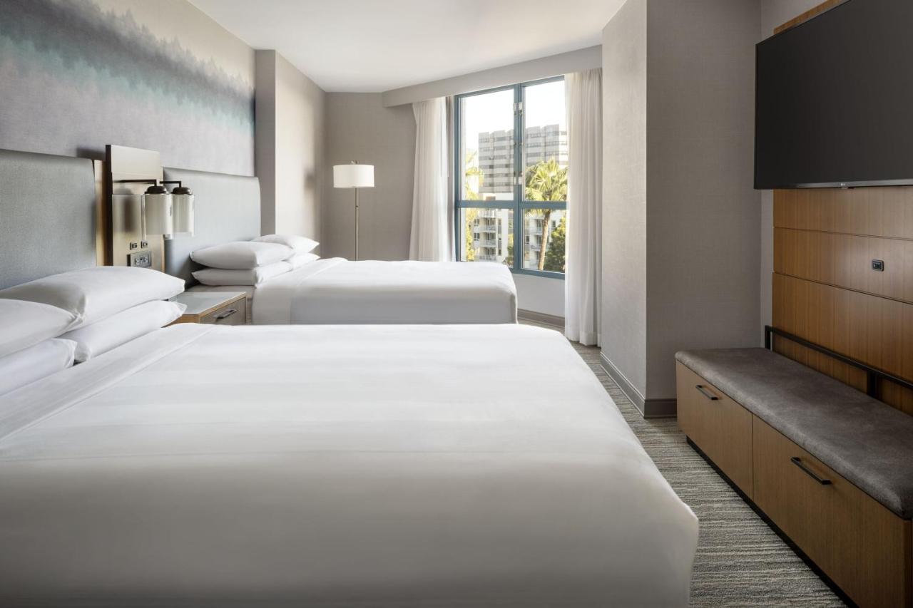 One Bedroom Suite with Two Double Beds or Twin Beds and a Sofa at Costa Mesa Marriott