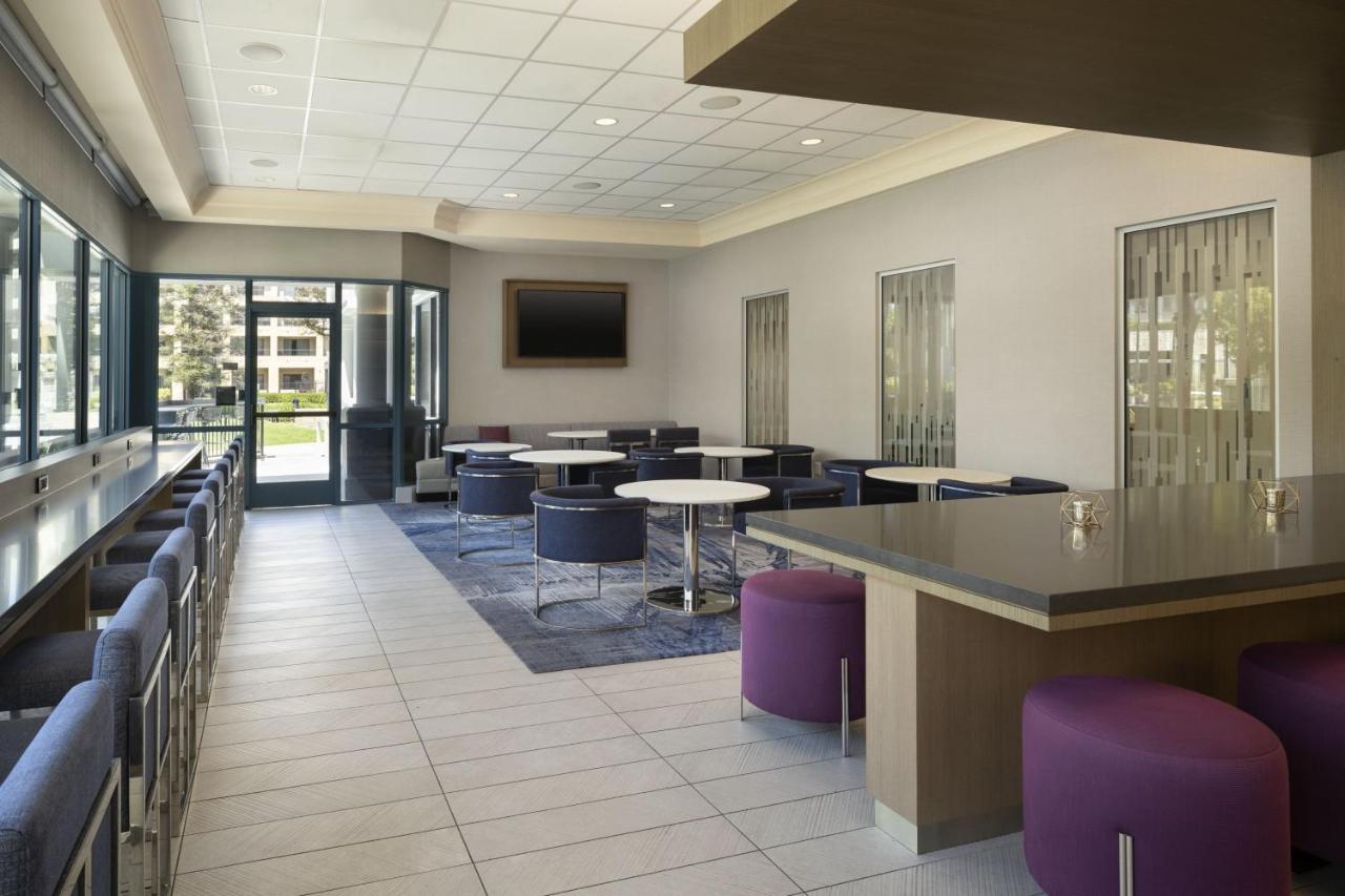 One Bedroom King Suite with Sofa, City View and Balcony at Costa Mesa Marriott