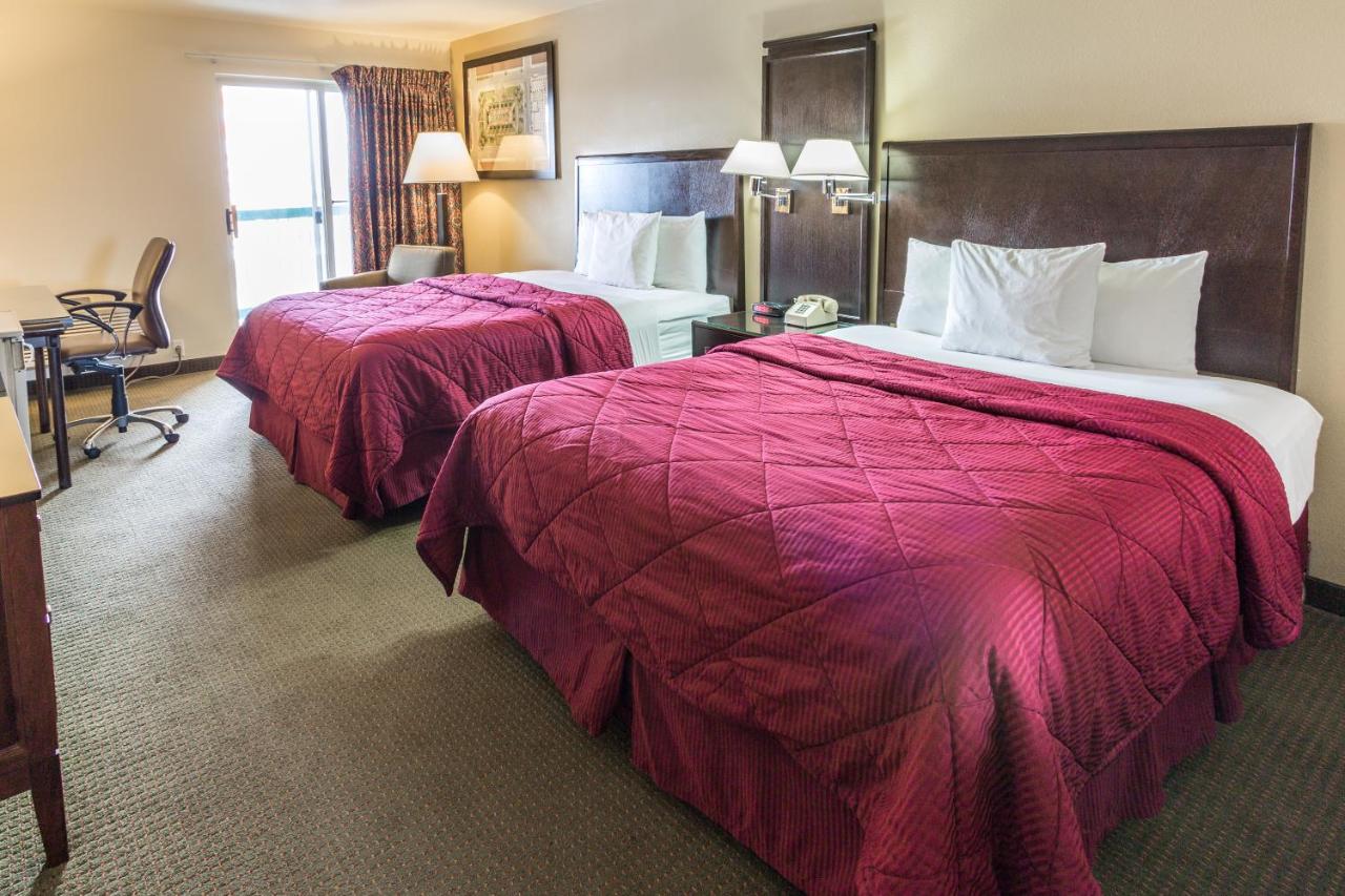 Queen Room with Two Queen Beds with Balcony - Non-Smoking / No Pets Allowed at Cedars Inn