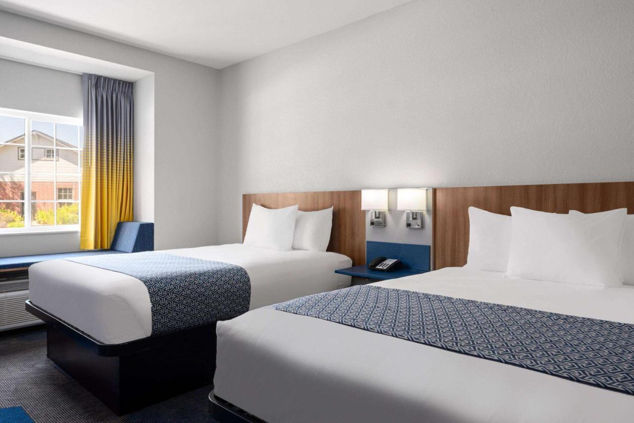 Queen Room with Two Queen Beds - Non-Smoking at Microtel Inn & Suites by Wyndham Houma