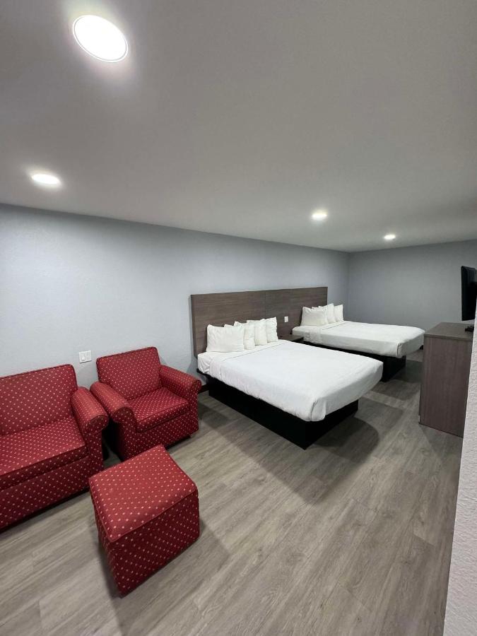Queen Room with Two Queen Beds at SureStay Hotel by Best Western Childress