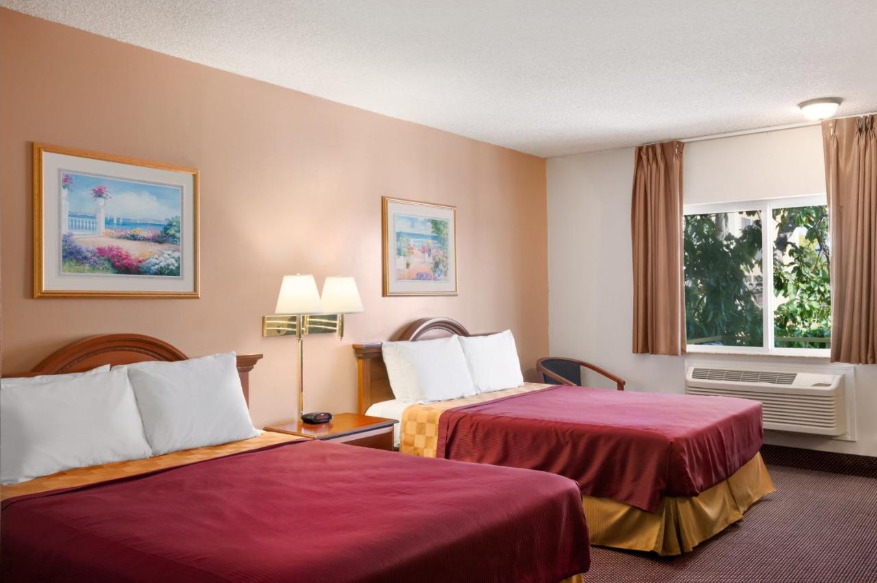 Queen Room with Two Queen Beds - Non-Smoking at Travelodge by Wyndham Bakersfield