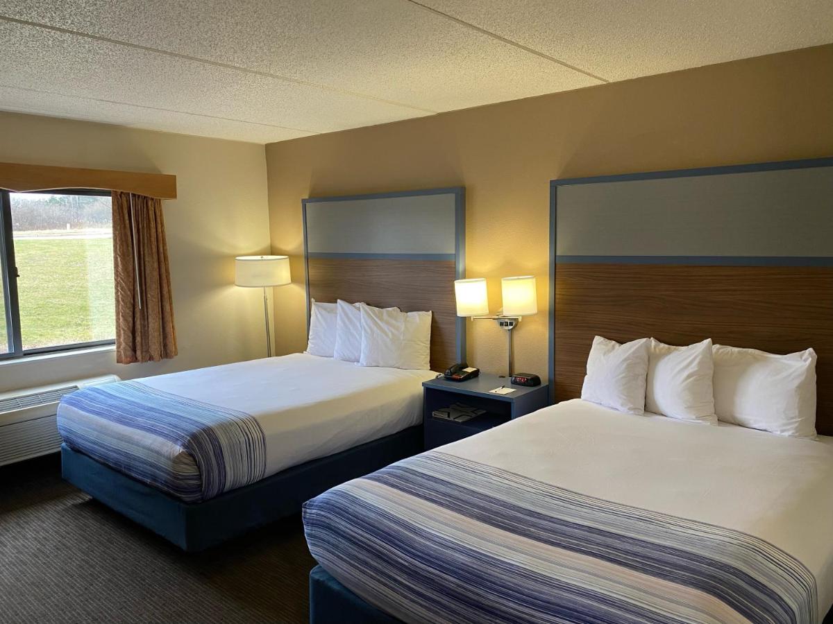 Queen Room with Two Queen Beds - Non-Smoking at AmericInn by Wyndham Greenville