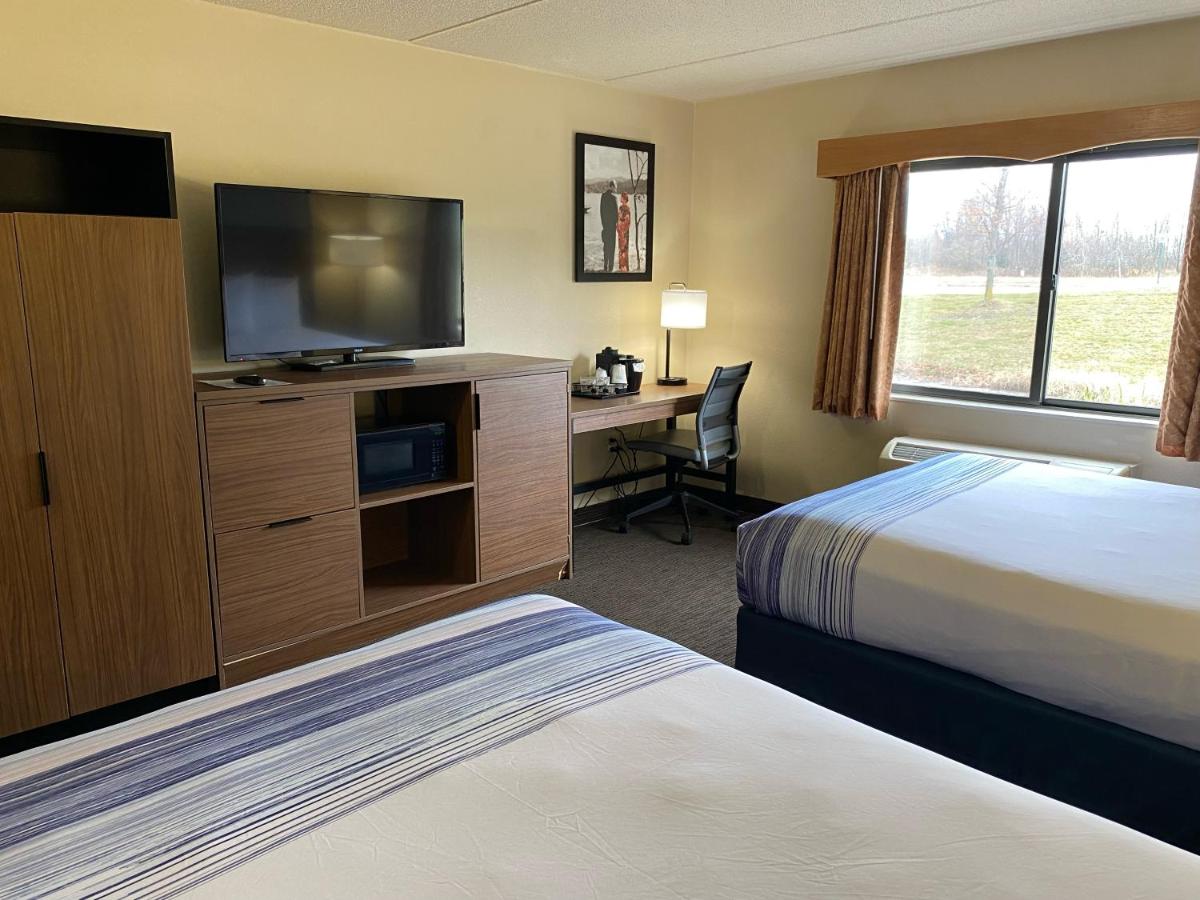 Queen Room with Two Queen Beds - Non-Smoking at AmericInn by Wyndham Greenville