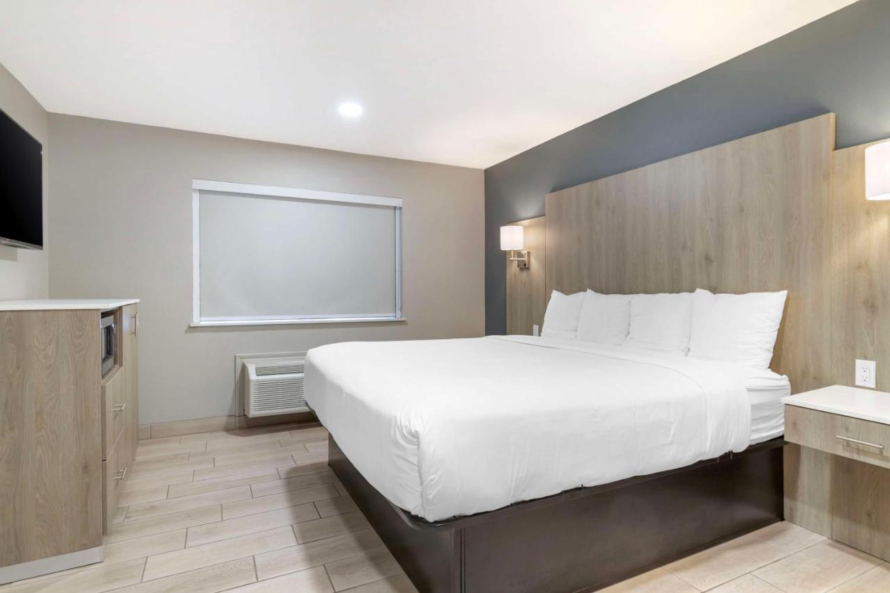 King Suite with Mobility Accessible Roll-In Shower at Best Western Plus Edinburg Inn & Suites