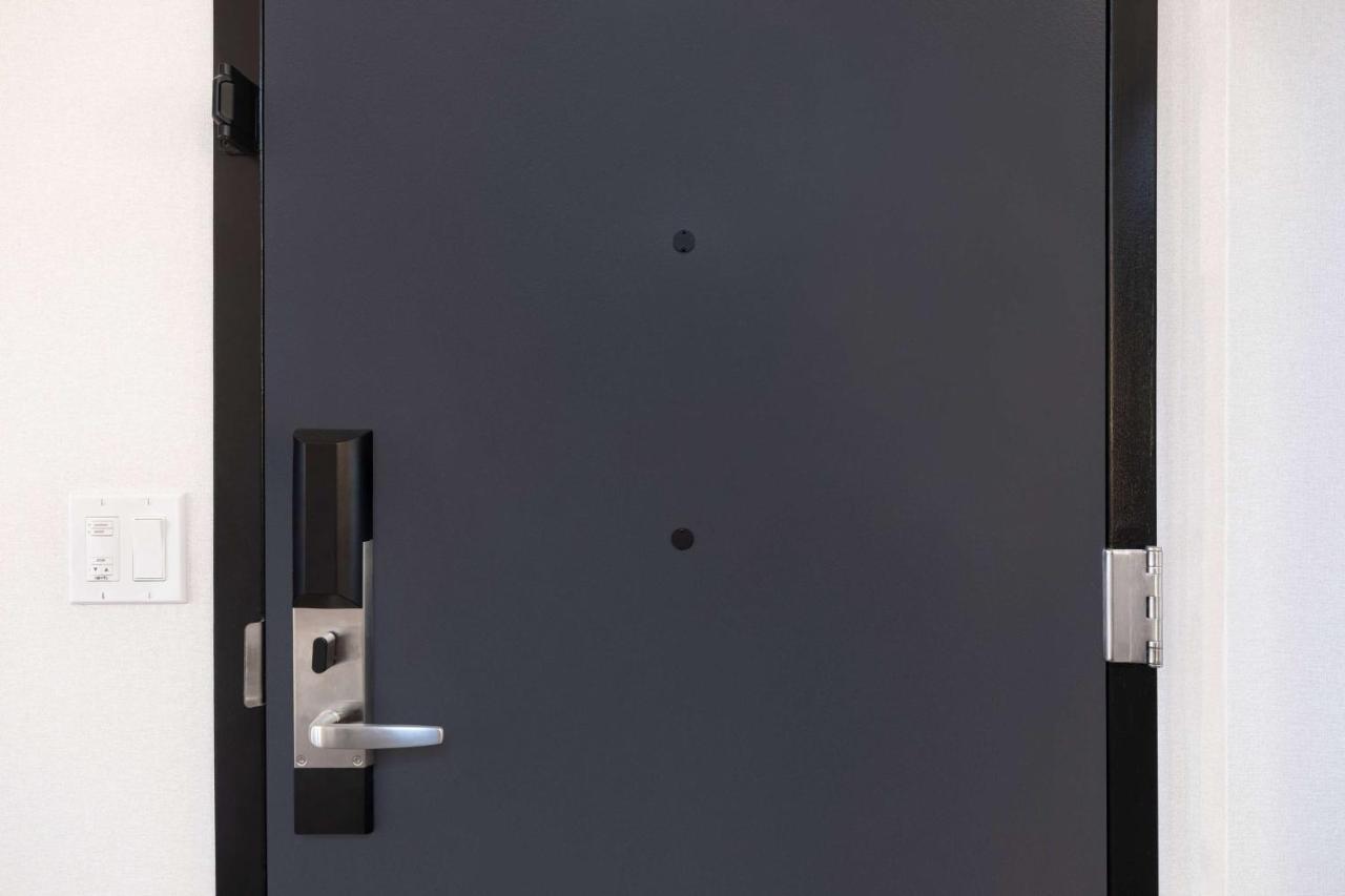Deluxe King Room - Hearing Accessible at Pennyweight Hotel Boston, Curio Collection by Hilton