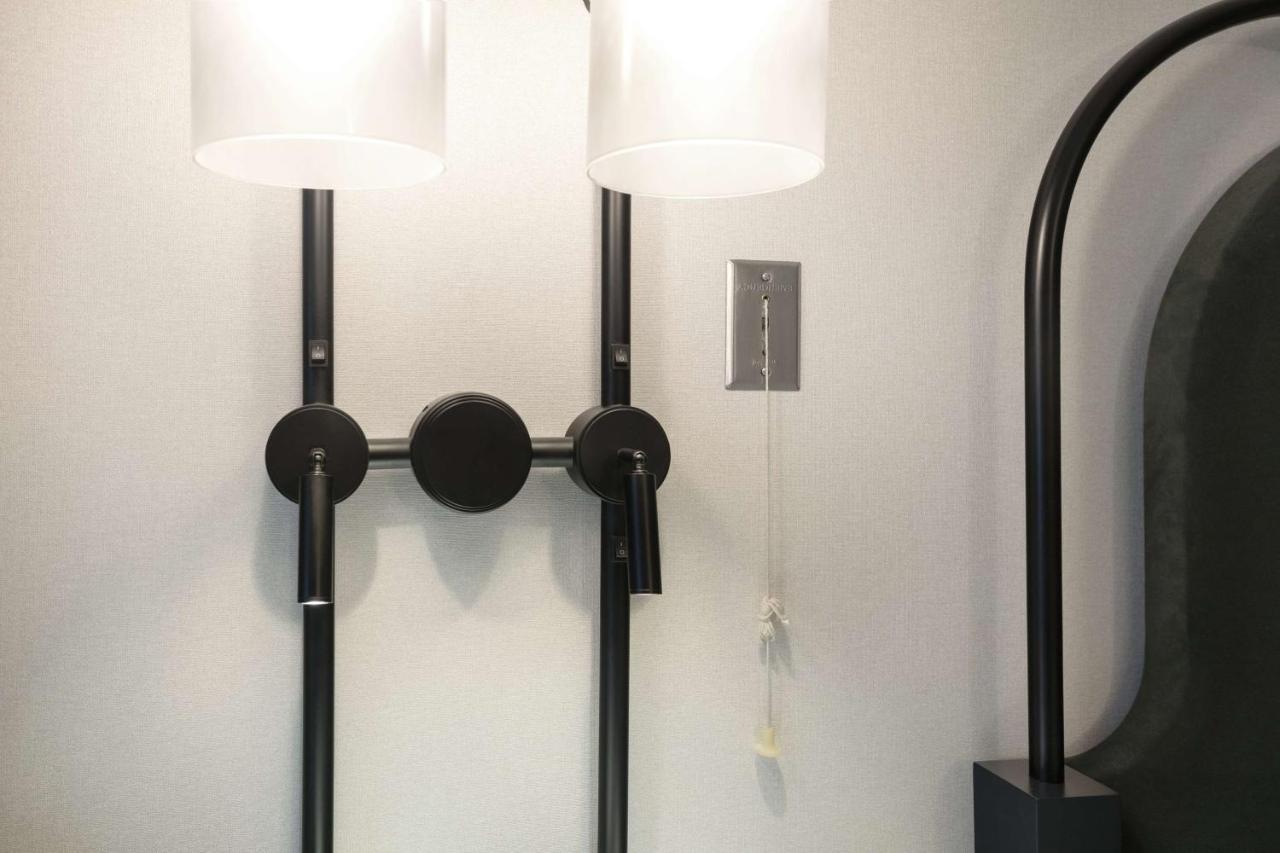 Deluxe King Room - Hearing Accessible at Pennyweight Hotel Boston, Curio Collection by Hilton