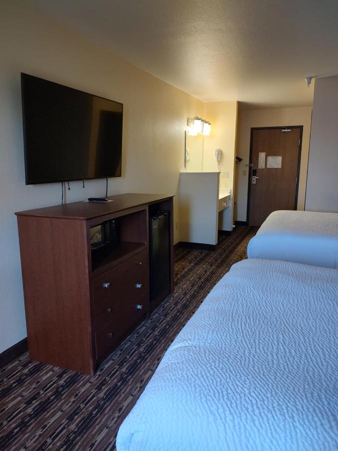 Queen Room with Two Queen Beds - Non-Smoking at Days Inn & Suites by Wyndham Fargo 19th Ave/Airport Dome